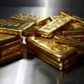 Gold sinks to 6-month low as speculative investors exit